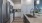 a kitchen with white cabinets