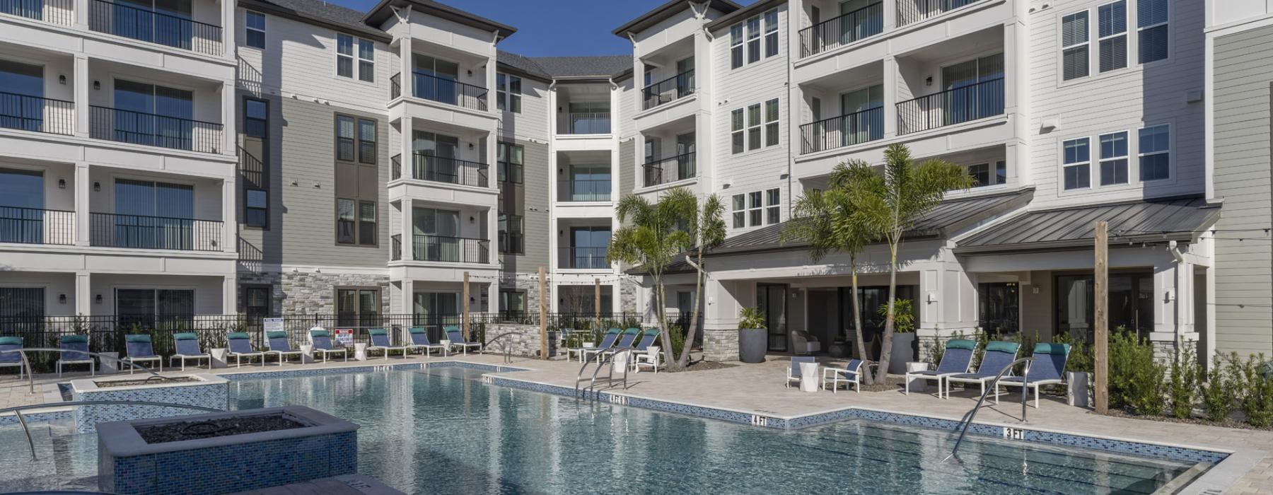 a pool in front of a building