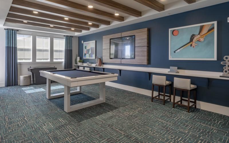 a room with a table and chairs