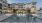 a pool in front of a building