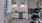 a kitchen with white cabinets